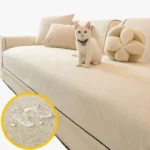 Protège canapé écru avec chat et gouttes d'eau qui ne pénètrent pas le tissu grâce à la membrane TPU