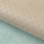 Tissu antidérapant au dos de la housse de canapé