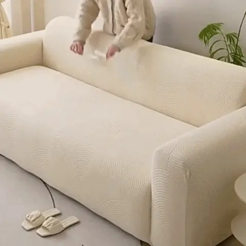 Protection Canapé Chat Extensible | Housse Jacquard Crème Utilisation des boudins en mousse pour caler et fixer la housse de canapé dans les fentes