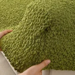 housse-canape-extensible-vert-elasticite Tissu gaufré Bulle de Crème vert, démonstration de l'élasticité haute mémoire de forme