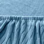 protection-canape-bleu-durable Gros plan bordure élastique plissée, Housse Canapé Jacquard Ondulé bleue durable