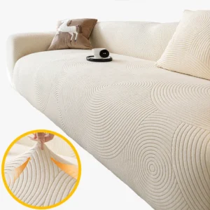 Housse Canapé Jacquard Spirale crème, motif cercles concentriques matelassé sur canapé
