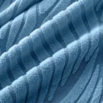 tissu-housse-canape-bleu Gros plan texture jacquard ondulé bleue, relief du tissu de la Housse Canapé